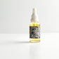 THE CURE universal face oil with rare emollients & botanical infusions
