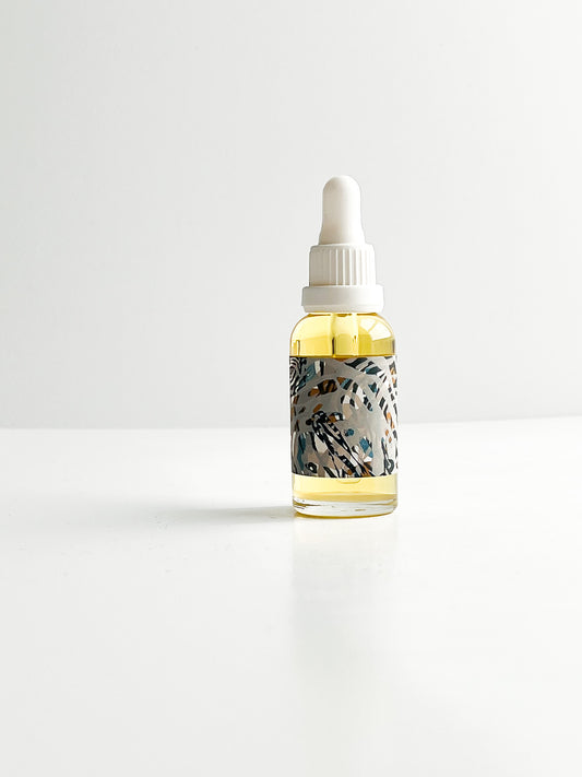THE CURE universal face oil with rare emollients & botanical infusions
