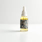 THE CURE universal face oil with rare emollients & botanical infusions
